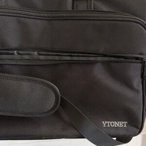 Laptop bag. Black, 17 inch adjustable strap multi-pocket like brand new!